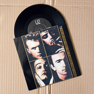 U2 - The Unforgettable Fire / A Sort Of Homecoming 7″